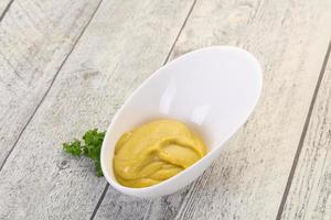 Mustard sauce in the bowl photo