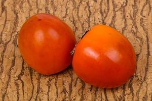 Sweet tasty persimmon photo