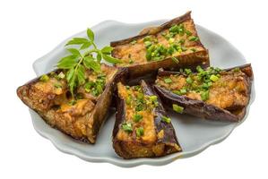 Grilled eggplant on white photo