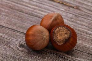 Hazelnut heap isolated over background photo