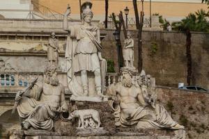 sculpture and fountain of Piazza del Popolo . The steps lead up to the pincio park, Rome, Italy photo