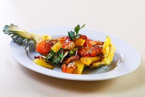 Pineapple with seafood photo