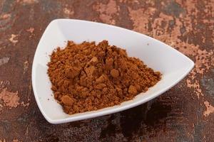 Cocoa powder in the bowl photo