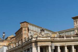 Buildings in Vatican, the Holy See within Rome, Italy. Part of Saint Peter's Basilica. photo