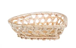 Wickerwork empty yellow breadbasket on white background photo