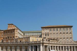 Buildings in Vatican, the Holy See within Rome, Italy. Part of Saint Peter's Basilica. photo