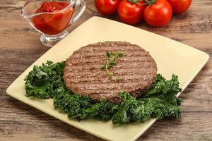 Grilled beef cutlet for burger photo