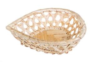 Wickerwork empty yellow breadbasket on white background photo