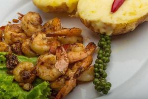 Garlic shrimps with potato photo