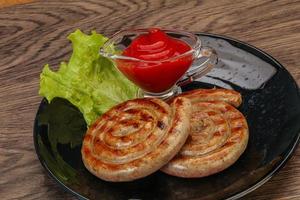 Grilled round pork tasty sausages photo