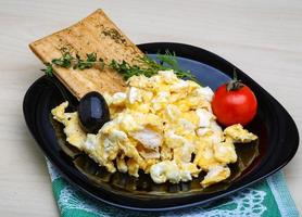 Scrambled eggs with tomato photo