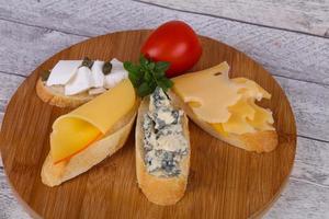 Bruschetta with various cheeses photo