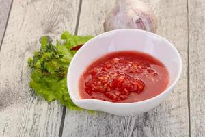Spicy tomato and garlic sauce photo