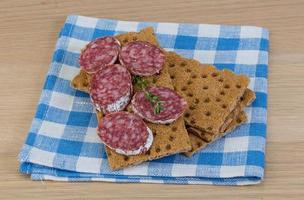 Crispbread with salami photo