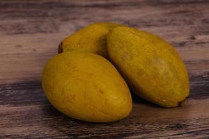 Exotic tropical fruit - Sapodilla in the plate photo