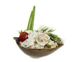 Bowl with traditional russian dish - pelmeni photo