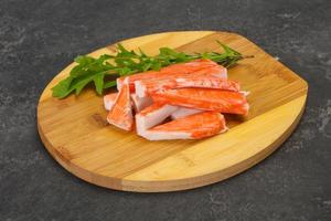 Crab stick surimi over board photo