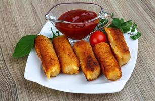 Roasted cheese sticks photo