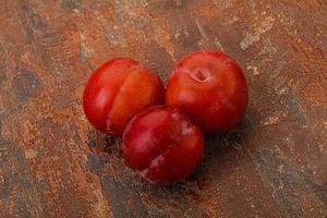 Ripe sweet tasty red plum photo