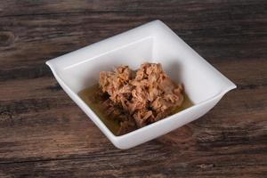 Canned tuna fish in the bowl photo