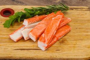 Crab stick surimi over board photo