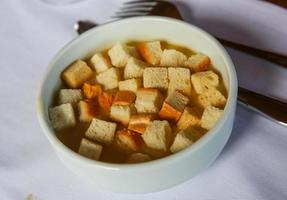 Soup with croutons photo