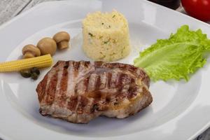 Grilled pork neck steak photo