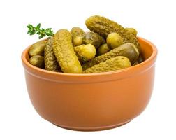 Marinated cucumbers, pickles in a bowl photo