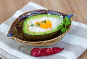 Egg backed in avocado photo