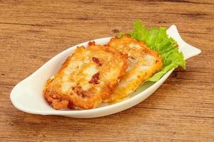 Roasted cod fish in bread photo