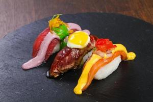 Sushi with tuna, salmon and beef photo