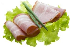 Bacon with salad leaves photo