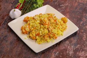 Traditional Pilaf with chicken and carrot photo