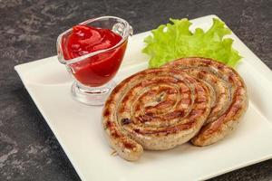 Grilled round pork tasty sausages photo