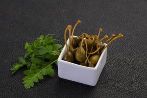 Pickled Capersberries in the bowl photo