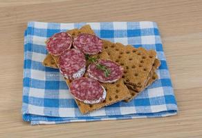 Crispbread with salami photo