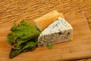 Blue cheese  with salad leaves photo