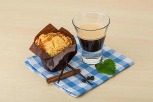 Muffin with espresso photo