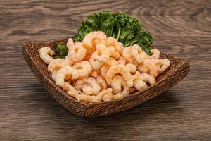 Small unshelled shrimps in the bowl photo