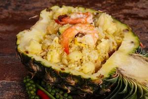 Fried rice with pineapple and prawns photo