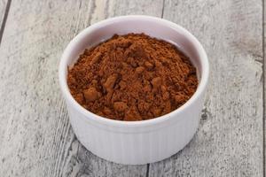 Cocoa powder in the bowl photo