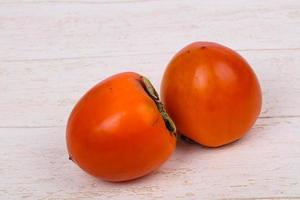 Sweet tasty persimmon photo