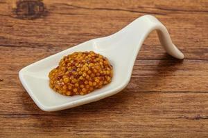 Dijon mustard sauce with seeds photo