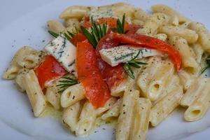 Penne with salmon photo