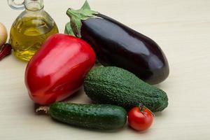 Eggplant, cucumber, avocado and red pepper photo