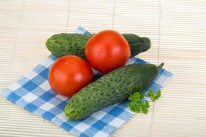 Tomato and cucumber photo