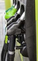 Petrol pumps at a gas station photo