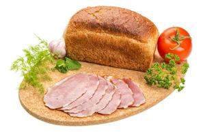 Ripe fresh ham with vegetables photo