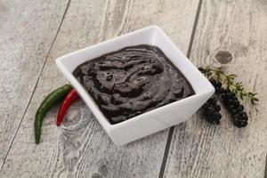 Black pepper sauce for meat photo