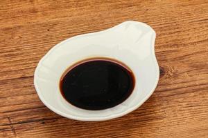 Asian soya sauce in the bowl photo